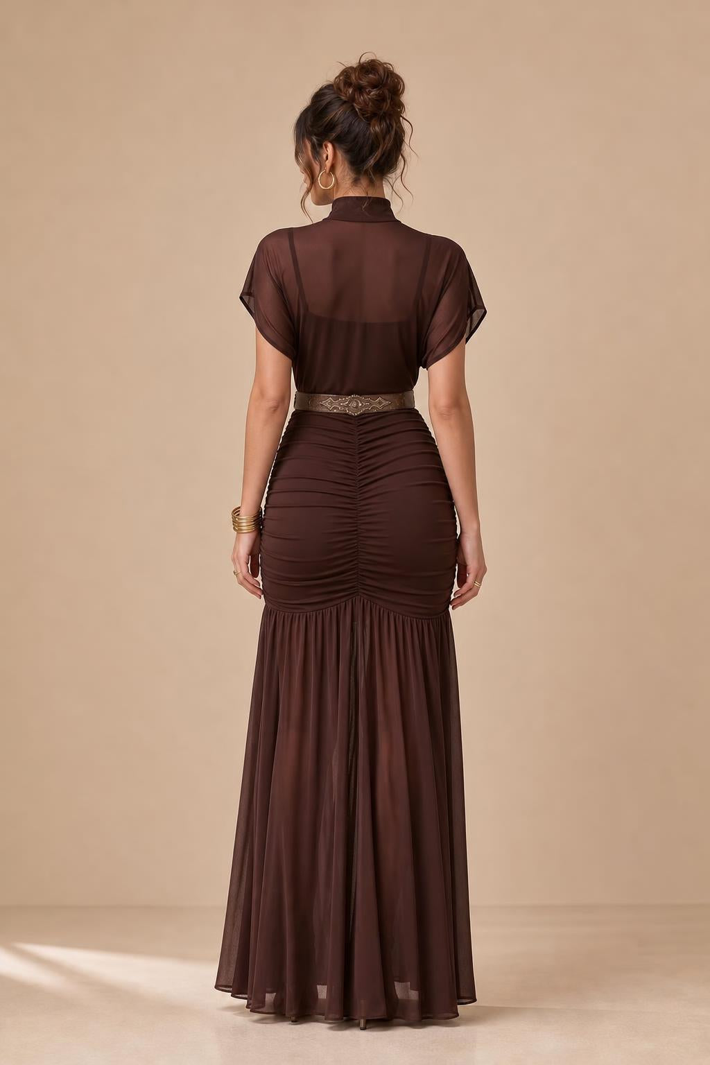 Back view showing the ruched back and tiered skirt details
